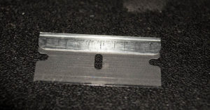 A fresh, clean razor blade is required.