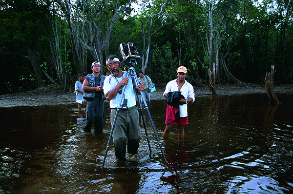 “Trudging through the jungle, carrying the large format camera. Shooting photographs was extremely brutal.”