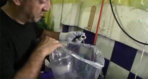 What exactly is Hernando Gil putting into this bag being prepared for shipping Altums, and why? Watch the video to find out!