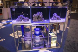 This creative display from Eshopps showcases their sumps, S-Series Skimmer, and new Eclipse slimline overflow boxes