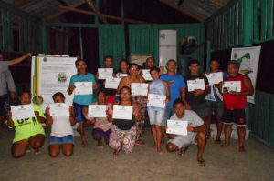 Some of the participants of the trainings proudly display their certificates after completing the workshop.