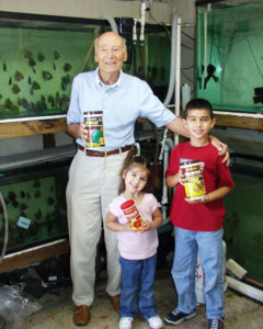 Jack Wattley, affectionately known by the children in his life as "Jungle Jack", posing here with the children of business partner Gabriel Posada.