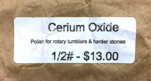 Cerium oxide powder for polishing etched aquarium glass.