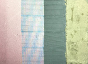 Basin construction layers, from left: pink extruded polystyrene foam, adhesive fiberglass tape, latex masonry waterproofer, surace bonding cement.